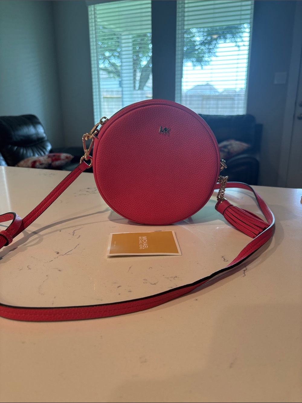 NWOT Michael Kors Coral Pink Round Crossbody Bag with Tassel